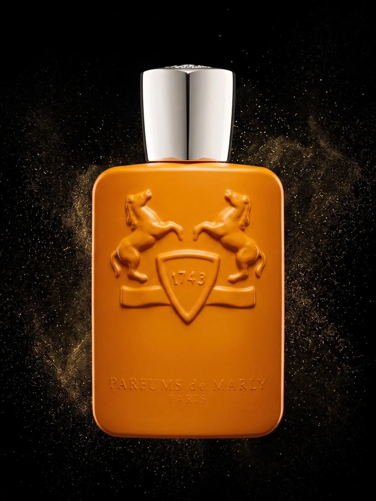Parfums de Marly Perseus 125ml orange bottle with silver cap on a black gold-dust background